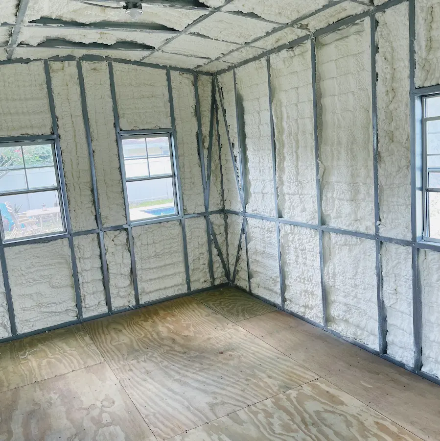 Closed-cell spray foam insulation applied to wall cavities in a residential project in Westport